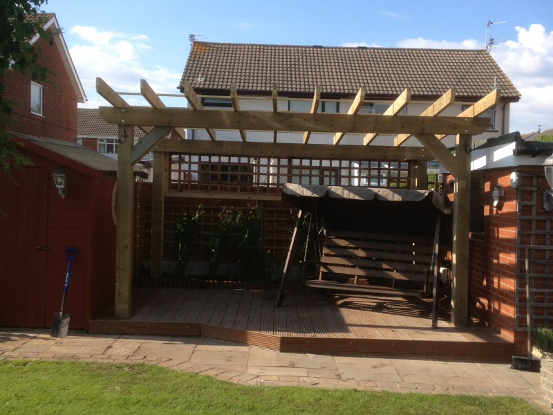 Photo - Decking / Pergola (1 of 1) - Decking with a feature pergola installed to the rear garden of a Fleetwood property. - Decking - Home - © J C Joinery