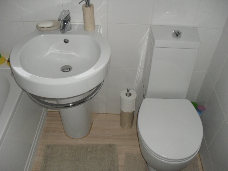 Photo - Cloakroom Toilet (1 of 1) - A downstairs toilet fitted for a Thornton customer using a contemporary bathroom suite. - Fitted Kitchens and Bathrooms - Home - © J C Joinery