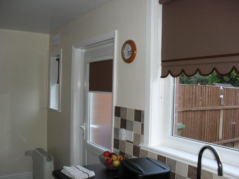 Photo - Kitchen Before and After (6  of 6) - New UPVC rear door with 6 point locking bolts and fresh plastered walls. - Property Refurbishment - Home - © J C Joinery