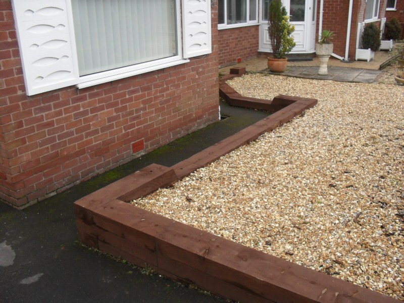 Photo - Raised Beds (1 of 1) - Raised beds with railway sleepers and golden gravel inset for garden in Preston. - Other Joinery and Building Work - Home - © J C Joinery