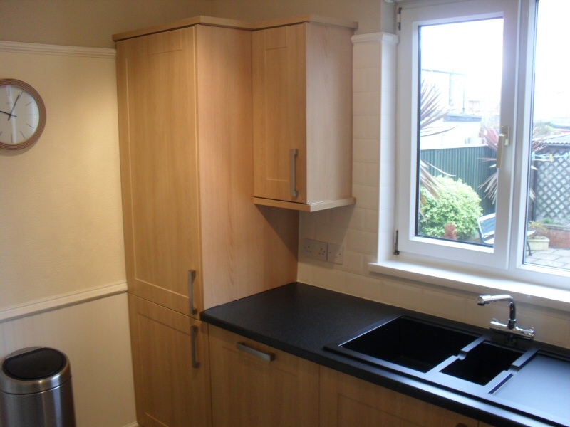 Photo - Solid Oak Kitchen (2 of 2) - View of contemporary, yet functional deep sink and drainer unit. - Fitted Kitchens and Bathrooms - Home - © J C Joinery