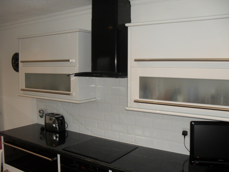 Photo - High Gloss Kitchen (1 of 2) - Ultra modern high gloss fitted kitchen in black and white for Lytham home. - Fitted Kitchens and Bathrooms - Home - © J C Joinery